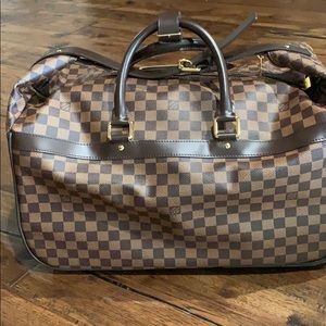 Louis Vuitton over night bag